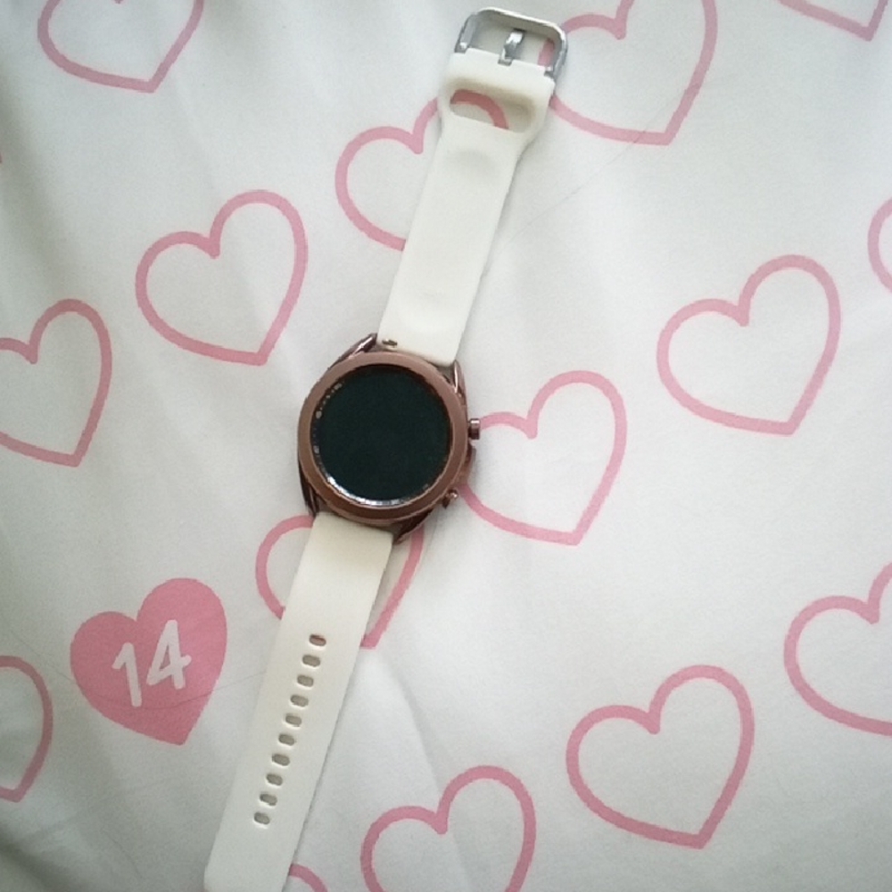 Samsung Smartwatch with White Band and Bronze Bezel